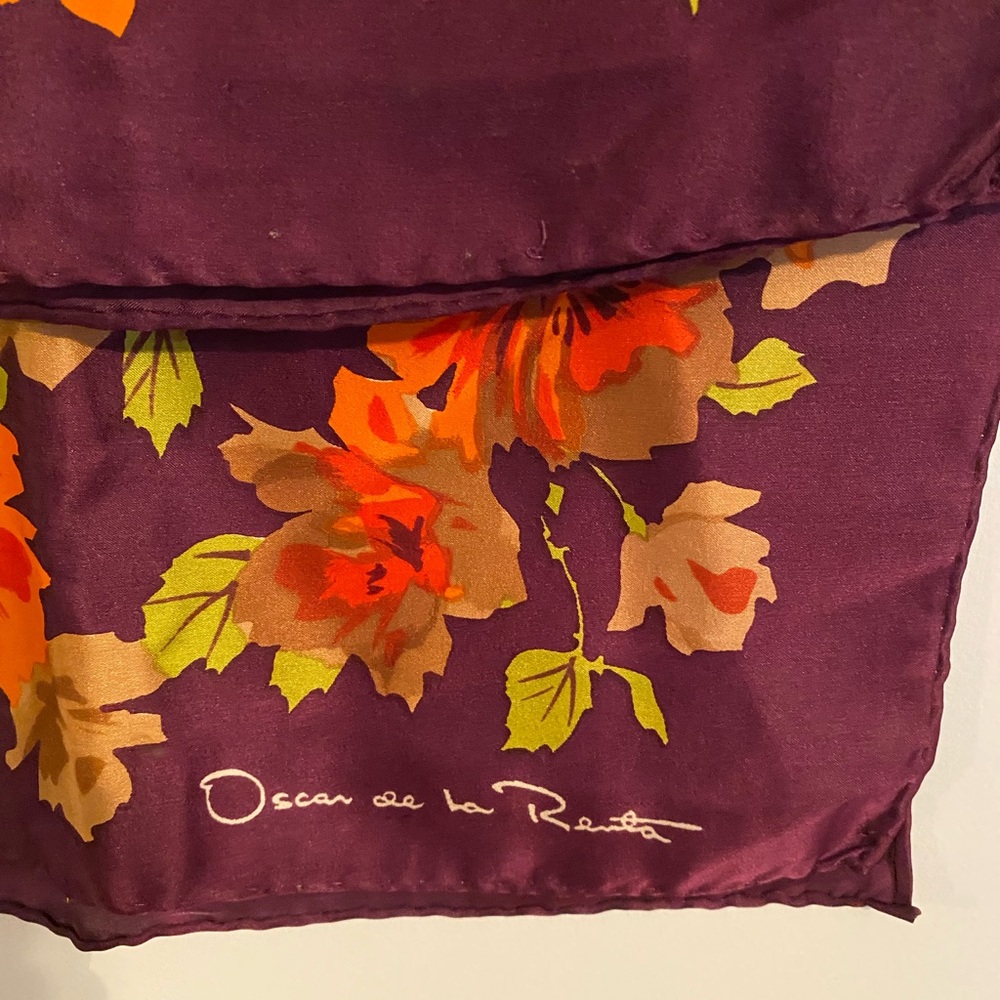 Oscar de la Renta silk scarf square with rolled edges.